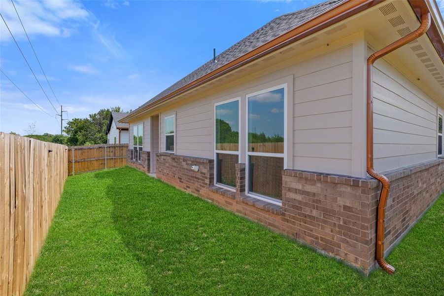Front exterior of a new home in , Granbury, TX, highlighting curb appeal (Image 18). Front exterior of a new home in , Granbury, TX, highlighting curb appeal (Image 18).