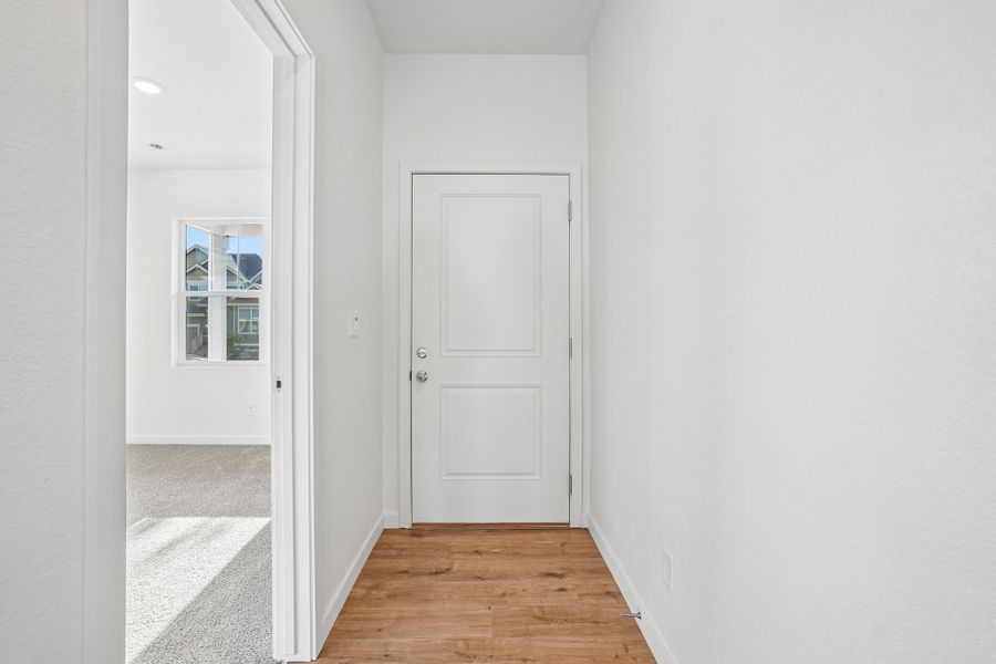 Spacious, unfurnished interior of a new home in Union Colony West, Greeley (Image 37).