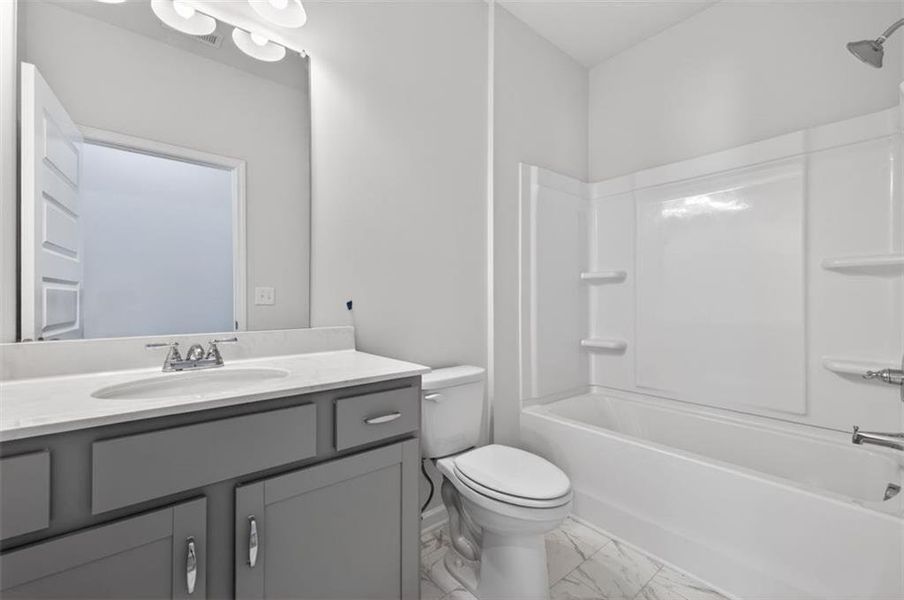 Furnished interior view inside a new home in Summerfield Place, Carrollton (Image 8).