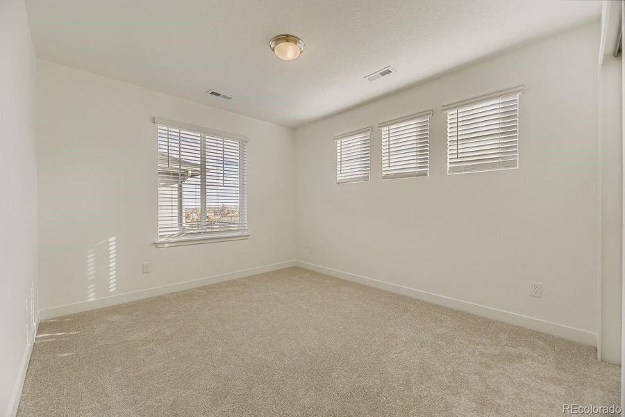 Spacious, unfurnished interior of a new home in Newlin Crossing: The Monarch Collection, Parker (Image 18). Spacious, unfurnished interior of a new home in Newlin Crossing: The Monarch Collection, Parker (Image 18).