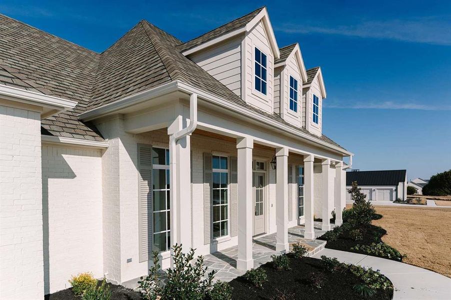 Front exterior of a new home in , Aledo, TX, highlighting curb appeal (Image 24).