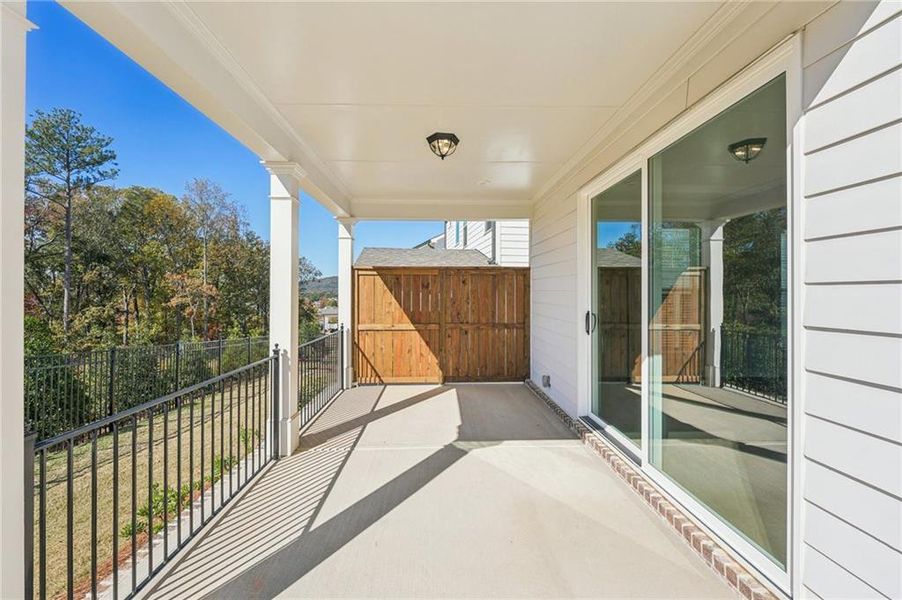Exterior details and patio area of a home in Palisades Single Family, Cumming (Image 33).