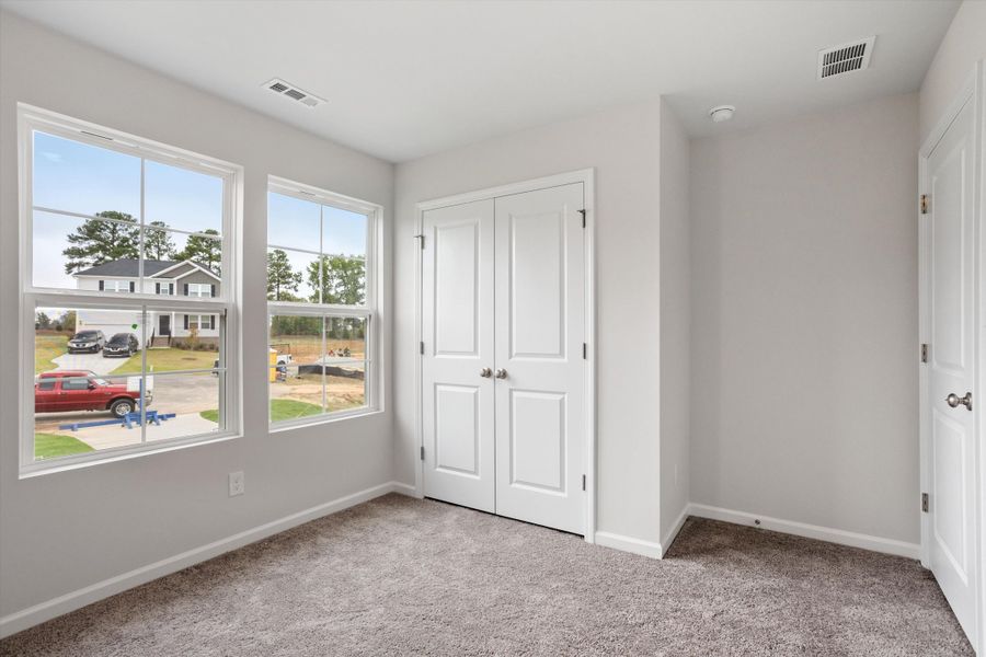 Spacious, unfurnished interior of a new home in Cambridge Reserve, Angier (Image 26).