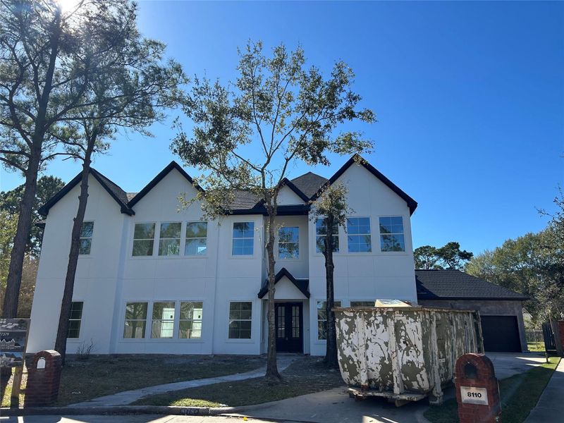 Front exterior of a new home in , Spring, TX, highlighting curb appeal (Image 8).
