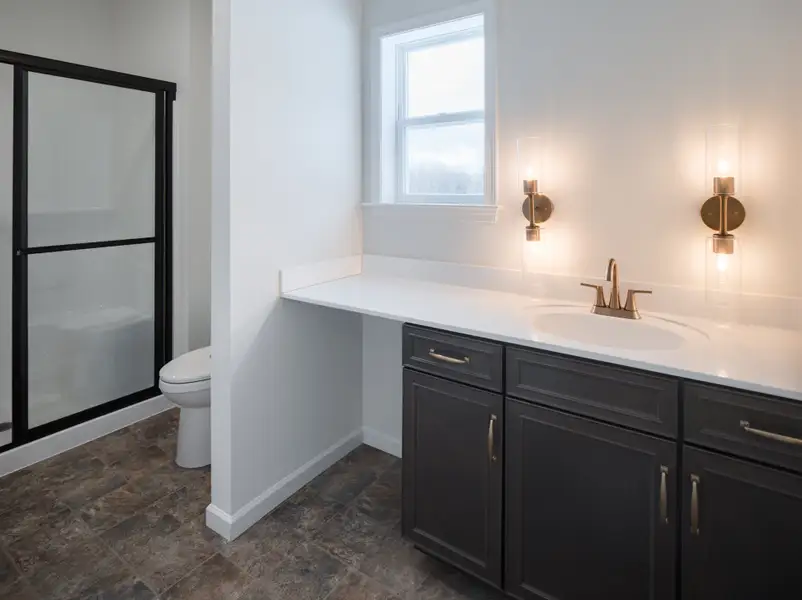 Representative furnished interior of a home built from the Harrison by Keystone Custom Homes in Edgewater on Lake Tillery, Norwood (Image 4).