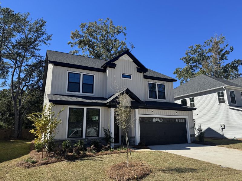 Front exterior of a new home in , North Charleston, SC, highlighting curb appeal (Image 28). Front exterior of a new home in , North Charleston, SC, highlighting curb appeal (Image 28).