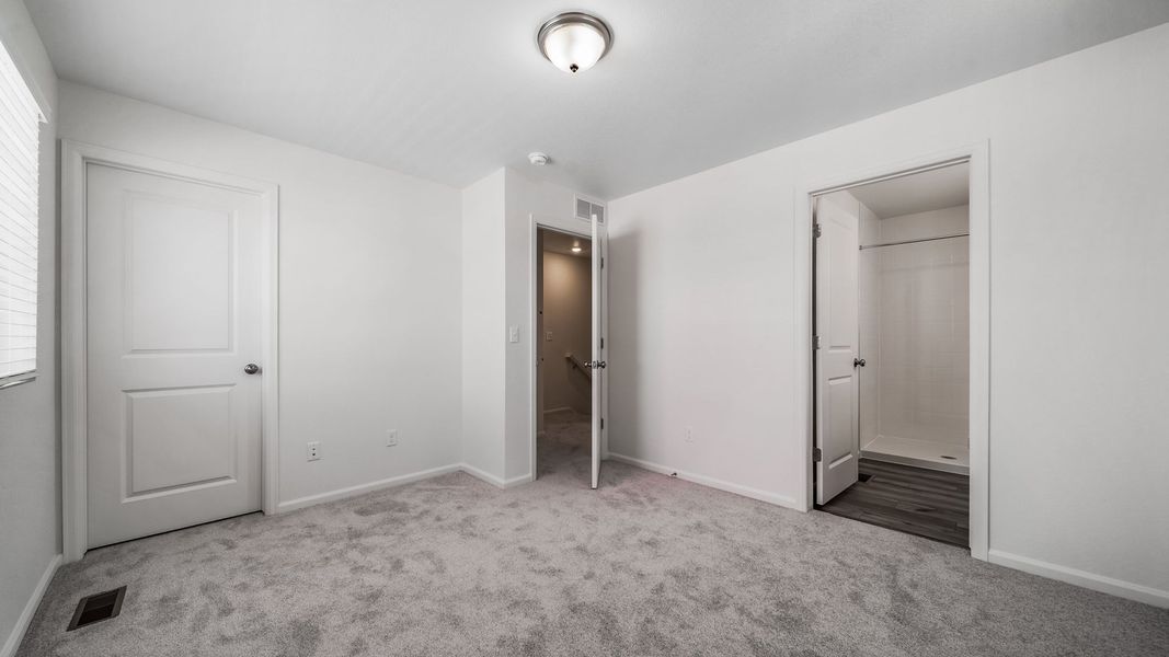 Spacious, unfurnished interior of a new home in Banning Lewis Ranch, Colorado Springs (Image 21).