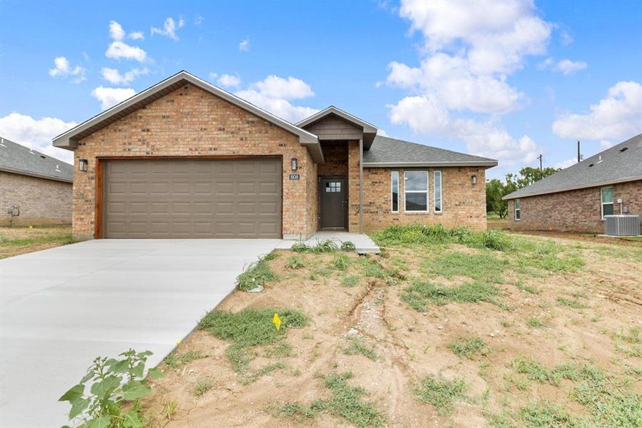 Front exterior of a new home in , Coleman, TX, highlighting curb appeal (Image 14).