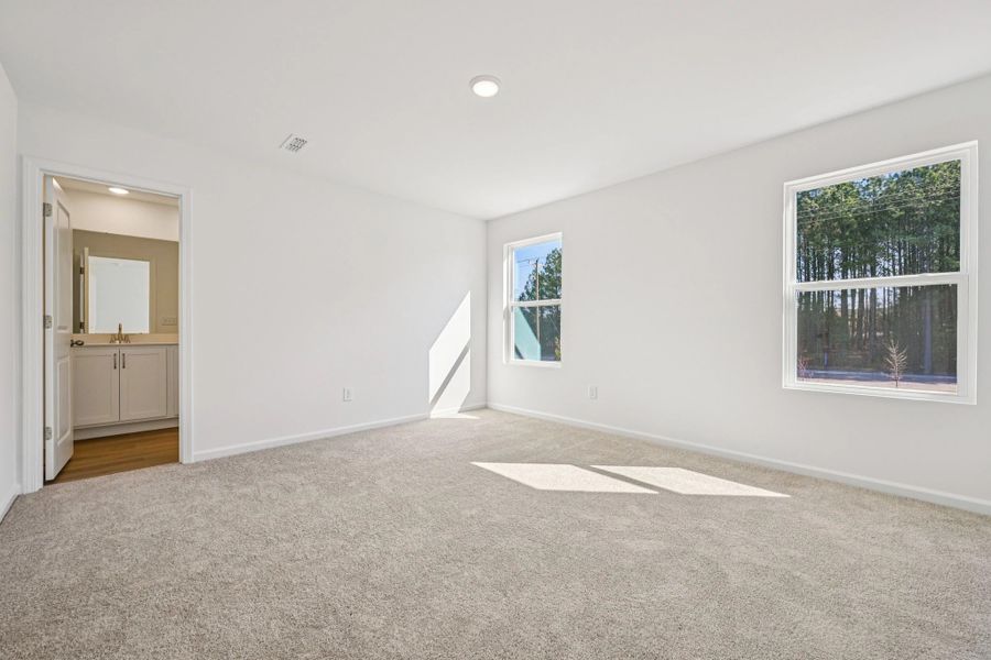 Primary Bed featuring the AW Collection® Timeless - Relaxed elegance with soft, neutral tones.