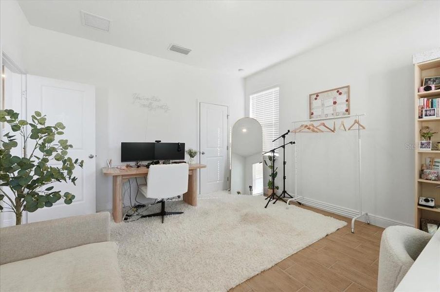 Furnished interior view inside a new home in Hills of Minneola, Minneola (Image 51).