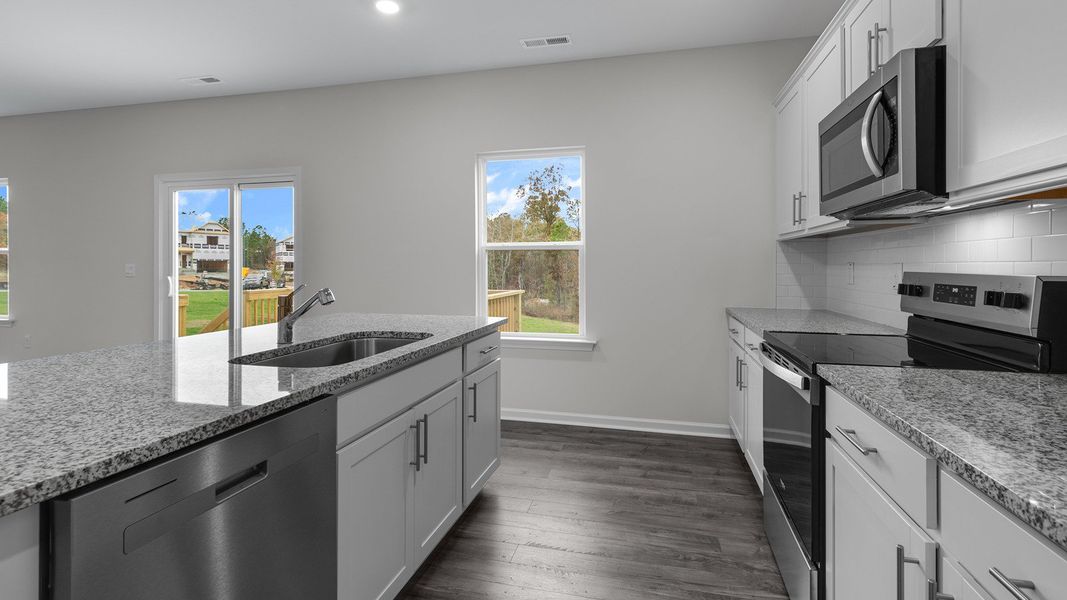 Furnished interior view inside a new home in Country Creek, Lexington (Image 5).