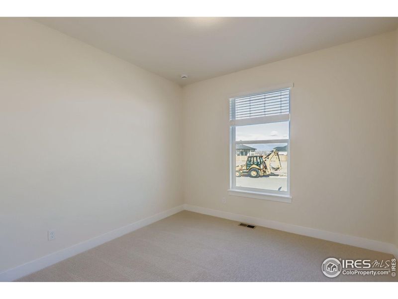 Spacious, unfurnished interior of a new home in RainDance National 60/70, Windsor (Image 25).