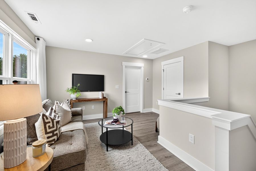 Representative furnished interior of a home built from the Weston End Unit by Baker Residential in Parc at Bradley Farm, Apex (Image 36).