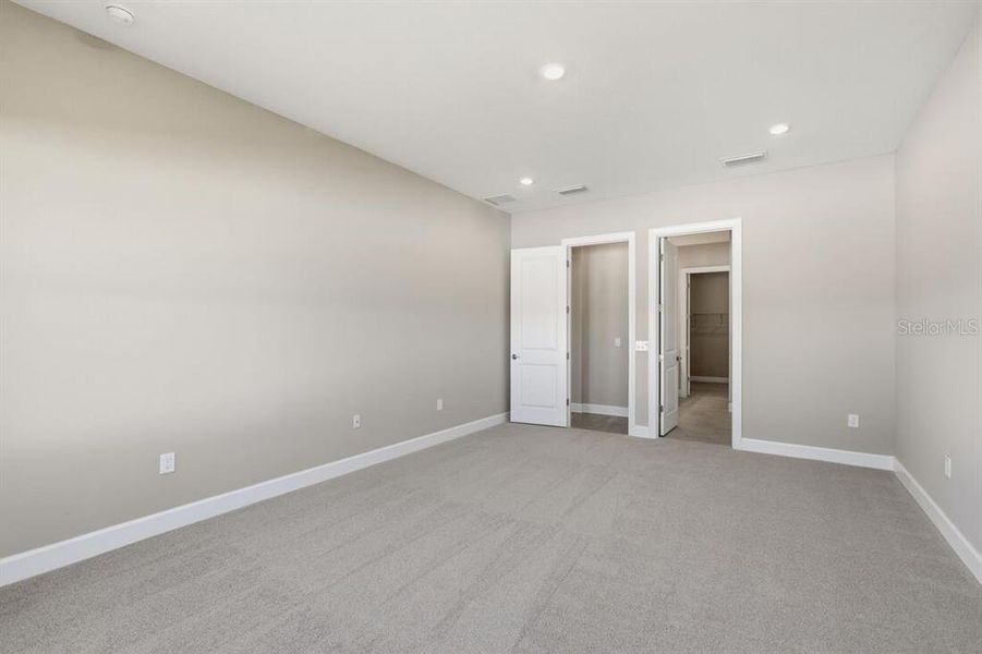 Spacious, unfurnished interior of a new home in Esplanade at Westview, Kissimmee (Image 30).