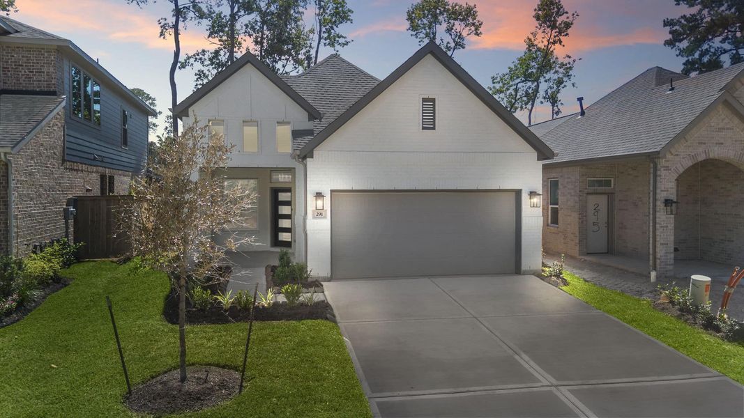 Front exterior of a new home in The Woodlands Hills, Willis, TX, highlighting curb appeal (Image 19). Front exterior of a new home in The Woodlands Hills, Willis, TX, highlighting curb appeal (Image 19).