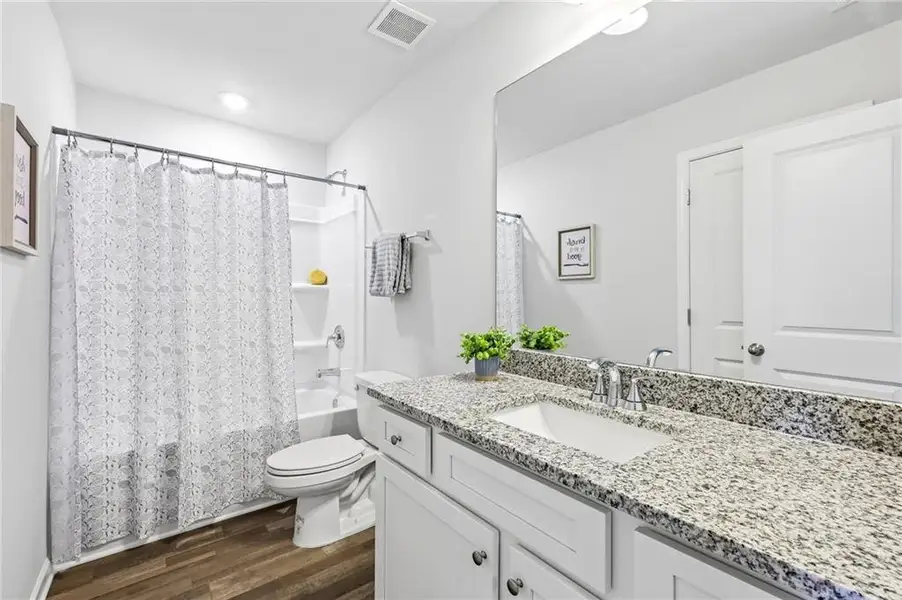 Furnished interior view inside a new home in The Hills at Cedar Creek, Winder (Image 10).