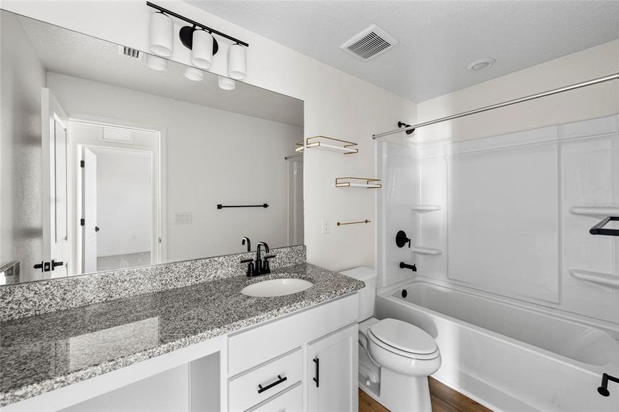 Furnished interior view inside a new home in Heron Bay, Palmetto (Image 15). Furnished interior view inside a new home in Heron Bay, Palmetto (Image 15).