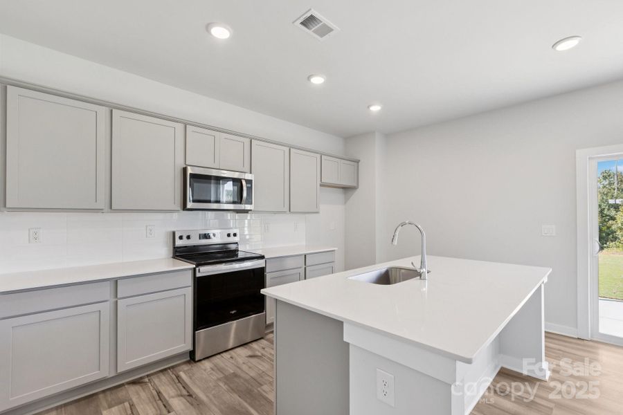 Furnished interior view inside a new home in Blue Sky Meadows, Monroe (Image 4). Furnished interior view inside a new home in Blue Sky Meadows, Monroe (Image 4).