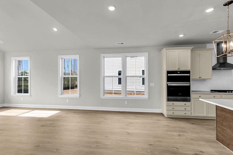 Spacious, unfurnished interior of a new home in Tidewater at Lakes of Cane Bay, Summerville (Image 21).