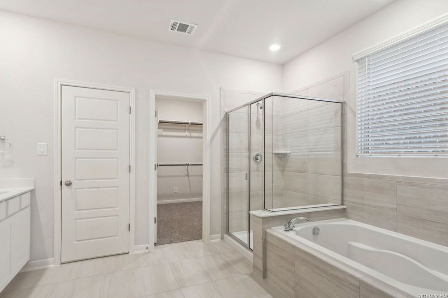 Furnished interior view inside a new home in Estancia Ranch - Classic Series, San Antonio (Image 15).