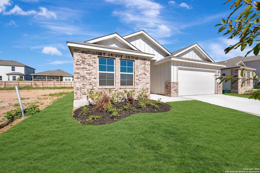 Front exterior of a new home in Greenspoint Heights, Seguin, TX, highlighting curb appeal (Image 1). Front exterior of a new home in Greenspoint Heights, Seguin, TX, highlighting curb appeal (Image 1).