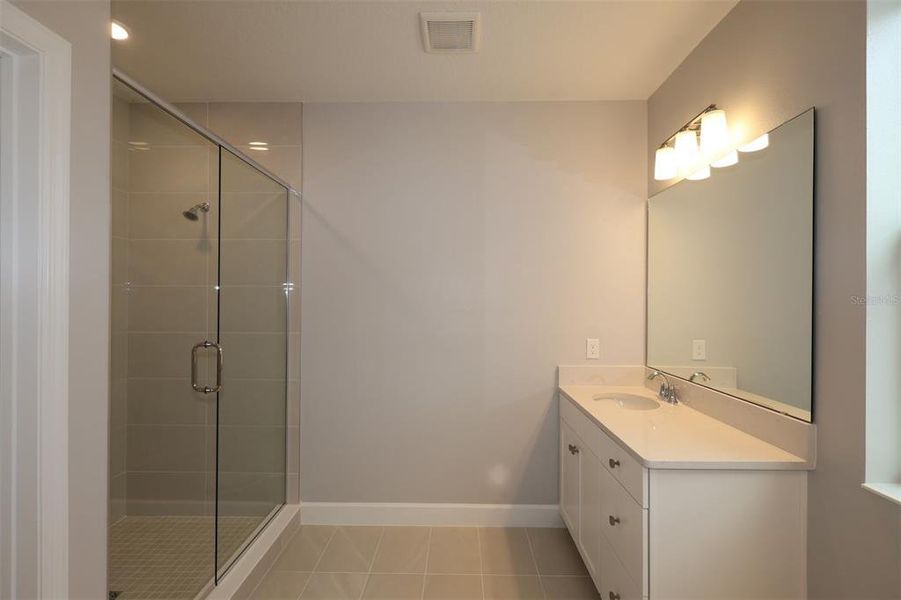 Furnished interior view inside a new home in Lake Star at Ovation, Winter Garden (Image 11).