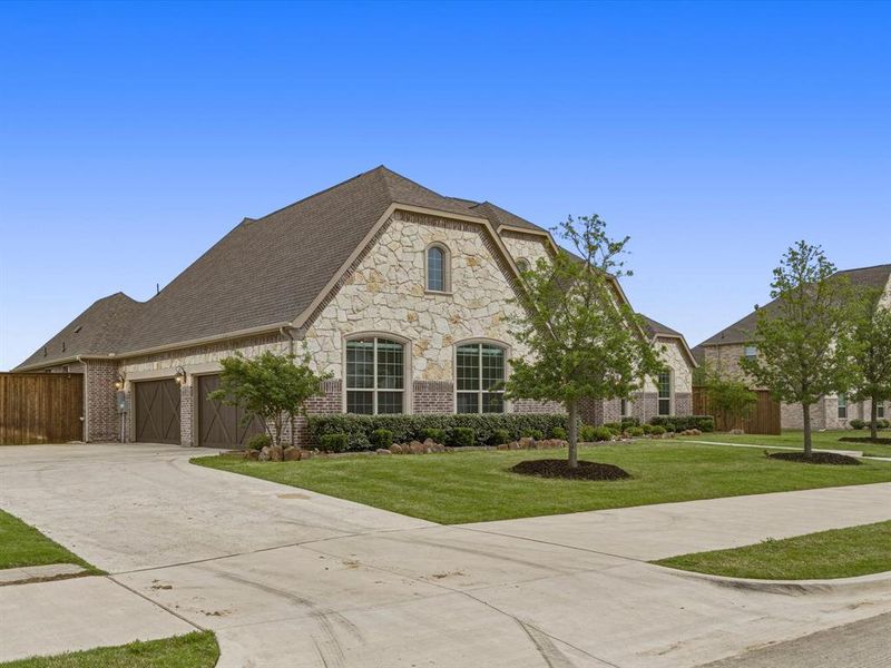 Front exterior of a new home in Gean Estates, Keller, TX, highlighting curb appeal (Image 22).