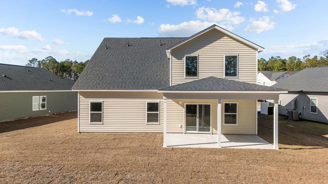 Exterior details and patio area of a home in Trieste at Bella Vita, Myrtle Beach (Image 4). Exterior details and patio area of a home in Trieste at Bella Vita, Myrtle Beach (Image 4).