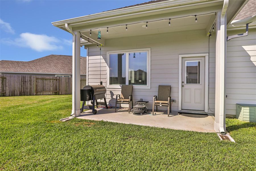 Exterior details and patio area of a home in Granger Pines, Conroe (Image 3).