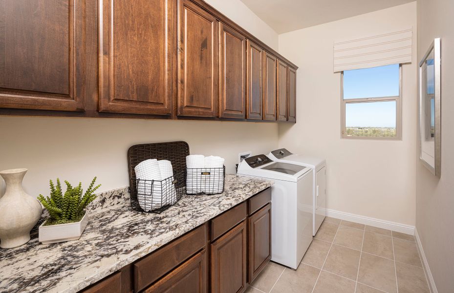 Upper Cabinets and Fridge in Laundry