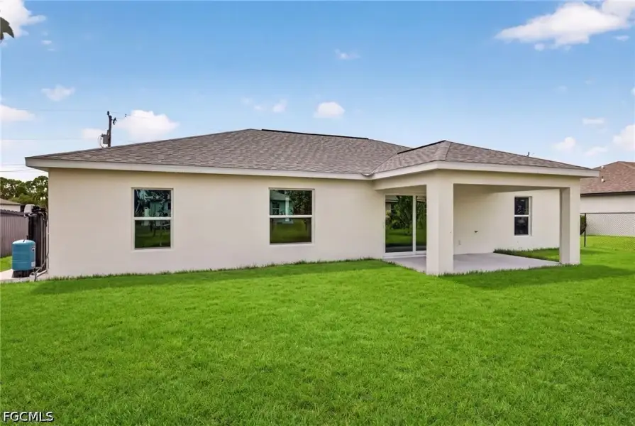Exterior details and patio area of a home in Cape Coral, Cape Coral (Image 23). Exterior details and patio area of a home in Cape Coral, Cape Coral (Image 23).