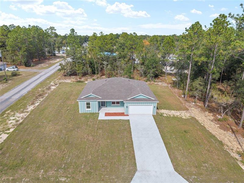 Front exterior of a new home in , Citrus Springs, FL, highlighting curb appeal (Image 2).