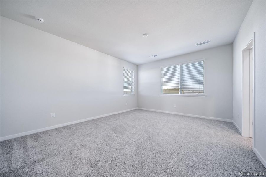 Spacious, unfurnished interior of a new home in Floret Collection at Alder Creek, Parker (Image 39).