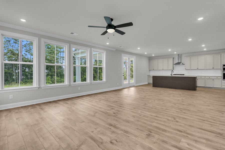 Spacious, unfurnished interior of a new home in Tidewater at Lakes of Cane Bay, Summerville (Image 38).