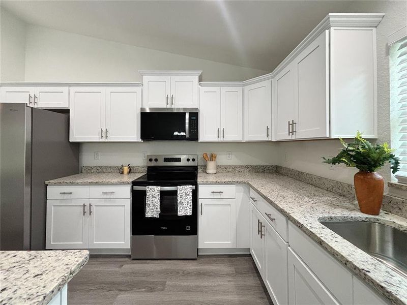 Furnished interior view inside a new home in , Dunnellon (Image 7).