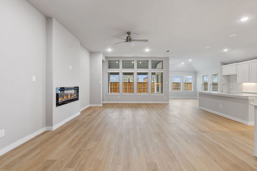 Living room in the Gilmour home plan by Trophy Signature Homes – REPRESENTATIVE PHOTO Living room in the Gilmour home plan by Trophy Signature Homes – REPRESENTATIVE PHOTO