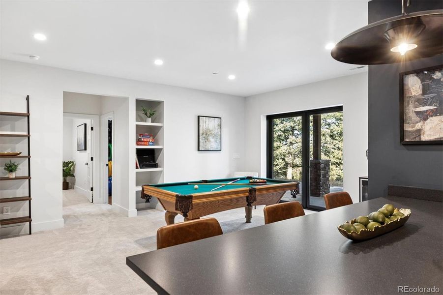 Access the walk out patio from the game room Access the walk out patio from the game room