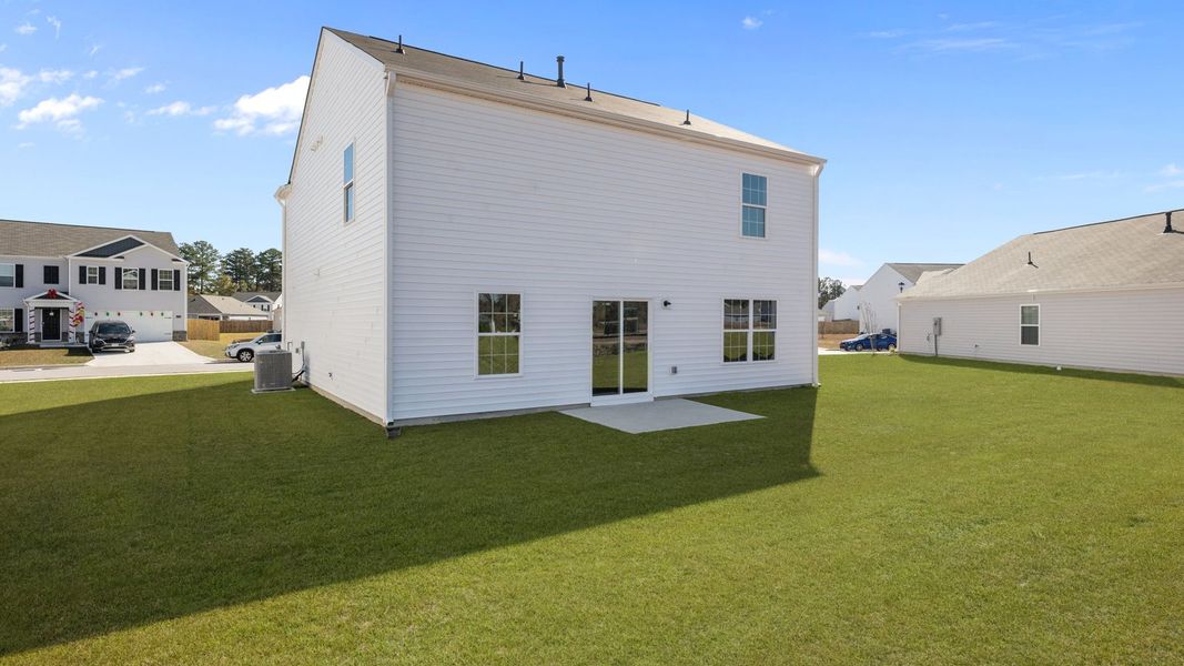 Exterior details and patio area of a home in Madeline Farm, New Bern (Image 19).