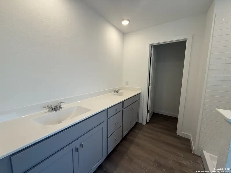 Furnished interior view inside a new home in Meadows at Hennersby Hollow 40's, San Antonio (Image 6).