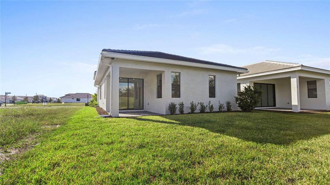 Exterior details and patio area of a home in Cresswind Lakewood Ranch, Lakewood Ranch (Image 4). Exterior details and patio area of a home in Cresswind Lakewood Ranch, Lakewood Ranch (Image 4).