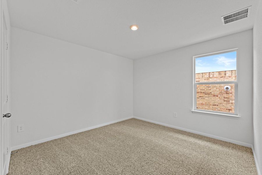Spacious, unfurnished interior of a new home in Bar W Ranch, Leander (Image 16).