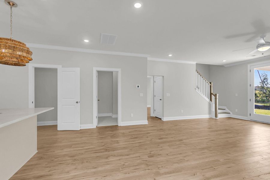 Spacious, unfurnished interior of a new home in Tidewater at Lakes of Cane Bay, Summerville (Image 22).