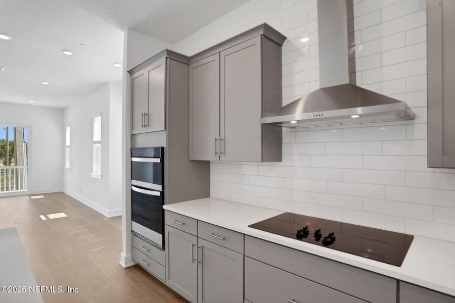 Furnished interior view inside a new home in North Beach Townhomes, Jacksonville Beach (Image 5).