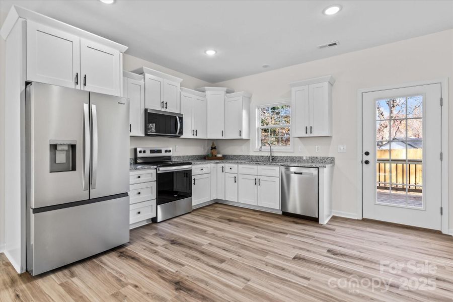 Furnished interior view inside a new home in , High Point (Image 6).
