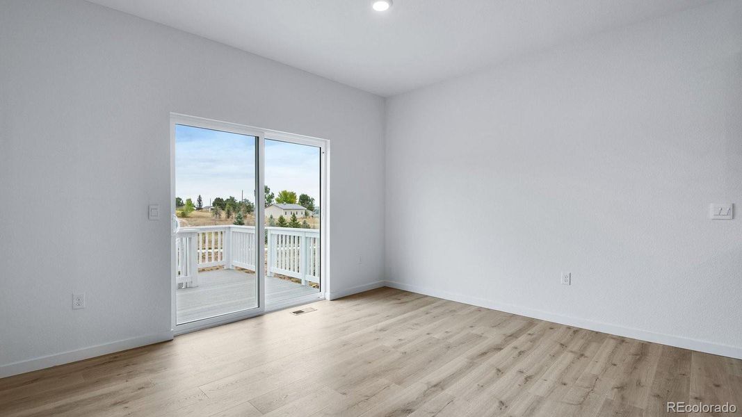 Spacious, unfurnished interior of a new home in Trails at Crowfoot, Parker (Image 16).