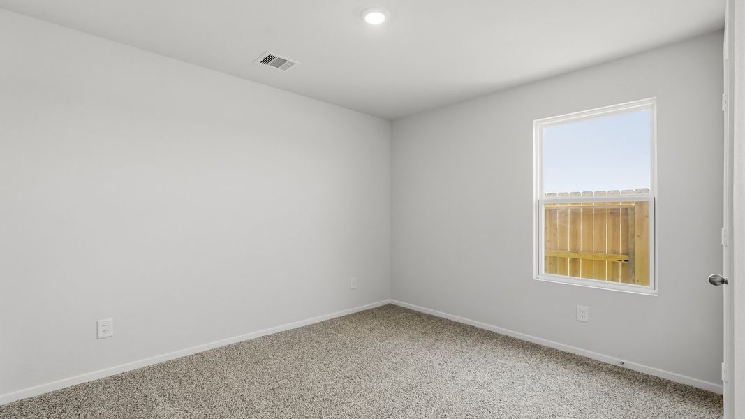 Spacious, unfurnished interior of a new home in Sunterra, Katy (Image 24).