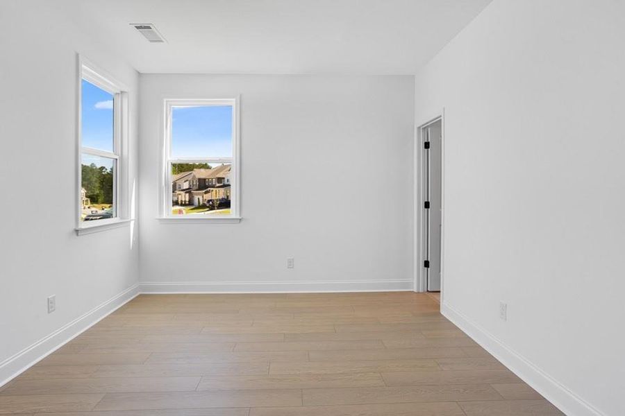 Spacious, unfurnished interior of a new home in Stratford Hills, Ball Ground (Image 16).