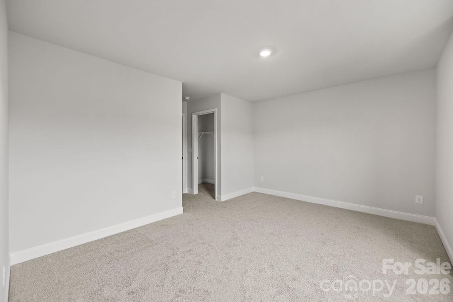 Large secondary bedroom with en-suite bath and walk in closet