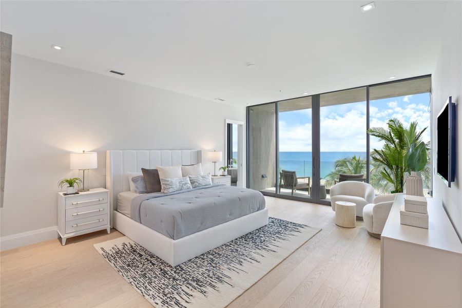 Primary bedroom with direct ocean views.