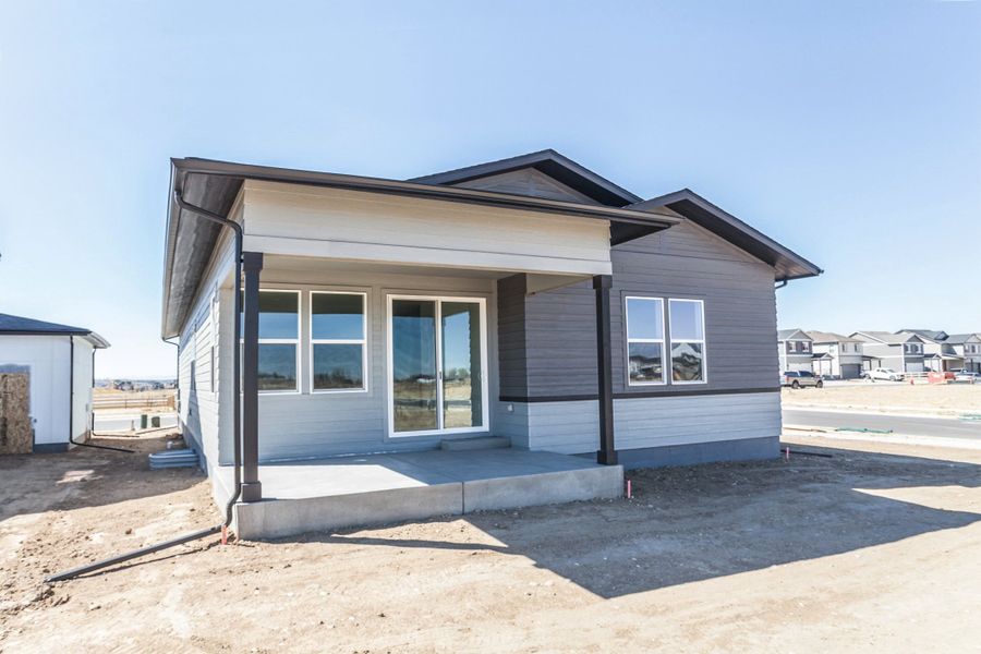 Exterior details and patio area of a home in Prairie Song, Windsor (Image 3).